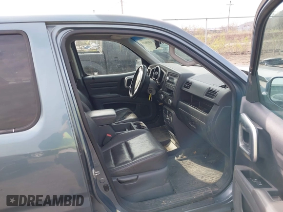 2008 Honda Ridgeline RTL with VIN 2HJYK16528H528826, listed as a IAAI auction lot 42016635 with 128,810 mi miles. Bid and sale history available at carsss.com. Image 5.