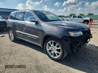 2014 Jeep Grand Cherokee Summit with VIN 1C4RJFJMXEC422730, listed as a Copart auction lot 64673525 with 145,761 mi miles and Non repairable. Bid and sale history available at DreamBid. Image 4.