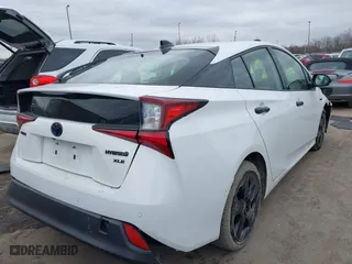 2022 Toyota Prius L Eco with VIN JTDKAMFU8N3175707, listed as a IAAI auction lot 41501024 with 42,103 mi miles. Bid and sale history available at carsss.com. Image 4.