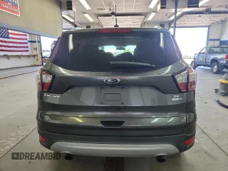 2018 Ford Escape SE z VIN 1FMCU9GD0JUC61682, wystawiony jako Copart lot #59105625 z przebiegiem 85 146 mil mil oraz Czysty tytuł • Clean title. Historia ofert i sprzedaży dostępna na DreamBid. Obrazek 6.