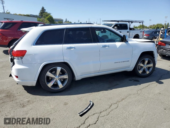 2015 Jeep Grand Cherokee High Altitude с VIN 1C4RJFCM2FC215232, выставлен на аукционе Copart как лот 60002875 с пробегом 122 813 миль миль и Списание • Salvage title. История ставок и продаж доступна на DreamBid. Изображение 3.