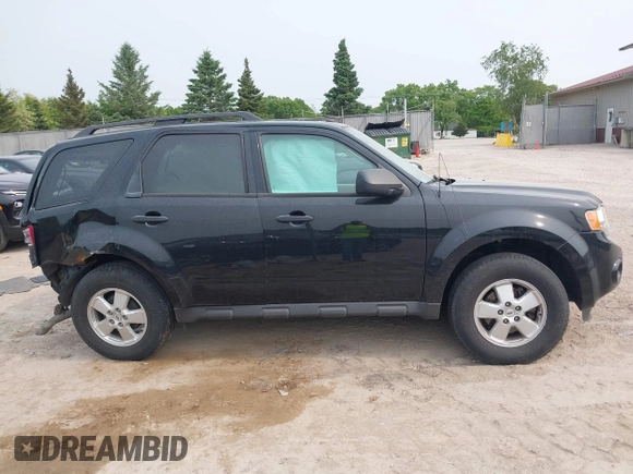 2012 Ford Escape XLT z VIN 1FMCU0DG3CKB39813, wystawiony jako IAAI lot #42378765 z przebiegiem 91 714 mil mil oraz . Historia ofert i sprzedaży dostępna na DreamBid. Obrazek 14.