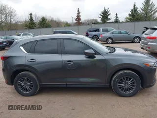 2020 Mazda CX-5 Touring with VIN JM3KFBCM2L0850855, listed as a IAAI auction lot 42147339 with 75,955 mi miles and . Bid and sale history available at carsss.com. Image 13.