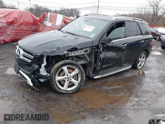 2019 Mercedes-Benz GLE 400 with VIN 4JGDA5GB3KB207679, listed as a IAAI auction lot 41556577 with 199,755 mi miles and . Bid and sale history available at DreamBid. Image 2.