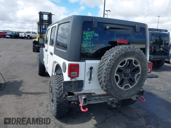 2016 Jeep Wrangler Unlimited Rubicon with VIN 1C4HJWFG7GL254143, listed as a IAAI auction lot 41781962 with 114,435 mi miles and . Bid and sale history available at DreamBid. Image 3.