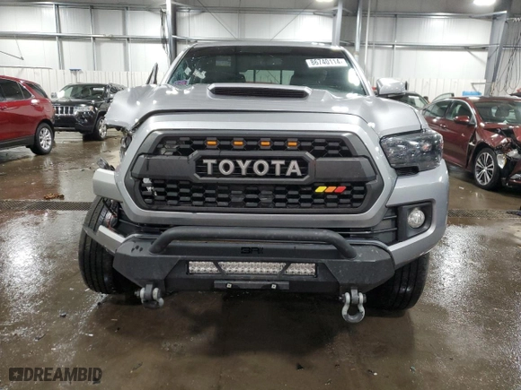 2017 Toyota Tacoma SR5 with VIN 3TMCZ5AN9HM109804, listed as a Copart auction lot 86740114 with 93,945 mi miles and Salvage Title. Bid and sale history available at carsss.com. Image 5.