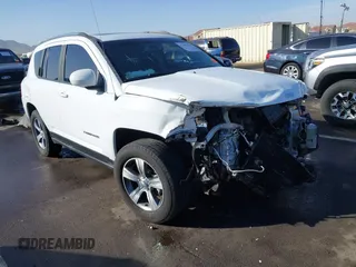 2016 Jeep Compass High Altitude Edition with VIN 1C4NJDEB8GD546245, listed as a IAAI auction lot 41557037 with 116,672 mi miles. Bid and sale history available at carsss.com. Image 1.