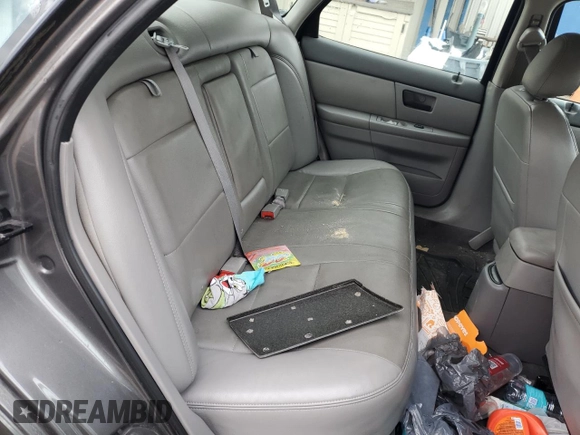 2004 Ford Taurus SES with VIN 1FAFP55U34A113140, listed as a Copart auction lot 53606615 with 99,800 mi miles and Salvage Title. Bid and sale history available at DreamBid. Image 10.