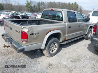 2002 Dodge Dakota SLT with VIN 1B7HG48N82S616607, listed as a IAAI auction lot 41837480 with 328,430 mi miles. Bid and sale history available at carsss.com. Image 4.