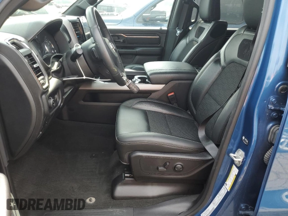 2024 Ram 1500 Big Horn with VIN 1C6RRFFG2RN210479, listed as a Copart auction lot 60485025 with 29,998 mi miles and Salvage title. Bid and sale history available at DreamBid. Image 7.