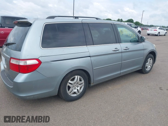 2007 Honda Odyssey EX-L z VIN 5FNRL38717B124209, wystawiony jako IAAI lot #42444334 z przebiegiem 230 123 mil mil oraz . Historia ofert i sprzedaży dostępna na DreamBid. Obrazek 4.