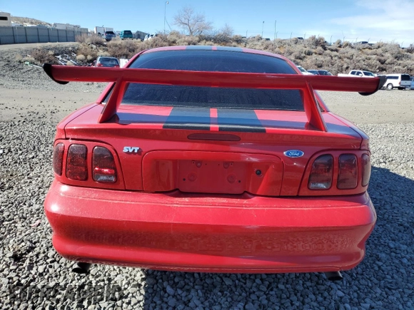 1997 Ford Mustang Cobra with VIN 1FALP47V9VF126238, listed as a Copart auction lot 45098285 with 0 mi miles and Salvage Title. Bid and sale history available at carsss.com. Image 6.