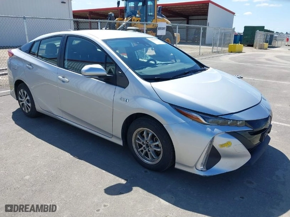 2021 Toyota Prius Prime LE with VIN JTDKAMFP4M3175051, listed as a IAAI auction lot 41856383 with 106,642 mi miles. Bid and sale history available at carsss.com. Image 1.