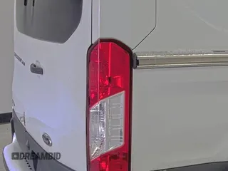 2018 Ford Transit z VIN 1FTYR1YG6JKA87506, wystawiony jako IAAI lot #42501070 z przebiegiem 167 892 mil mil oraz . Historia ofert i sprzedaży dostępna na DreamBid. Obrazek 6.