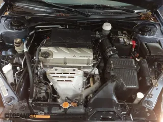 2008 Mitsubishi Eclipse GS with VIN 4A3AL25F28E003353, listed as a IAAI auction lot 41236418 with 108,728 mi miles. Bid and sale history available at carsss.com. Image 10.