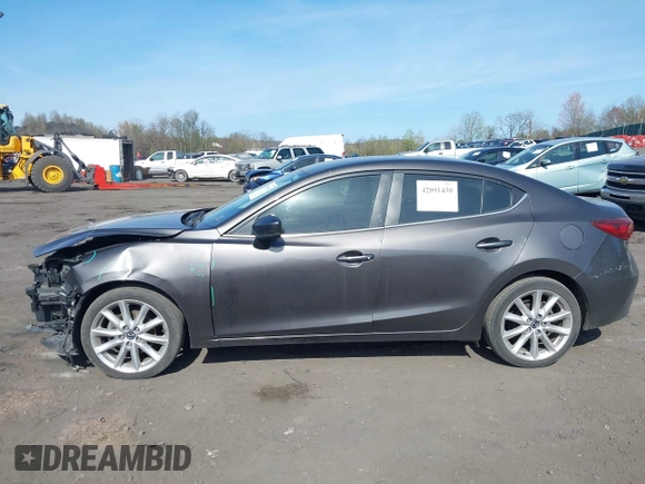 2017 Mazda 3 Touring z VIN 3MZBN1V70HM130081, wystawiony jako IAAI lot #42091430 z przebiegiem 114 480 mil mil oraz . Historia ofert i sprzedaży dostępna na DreamBid. Obrazek 14.