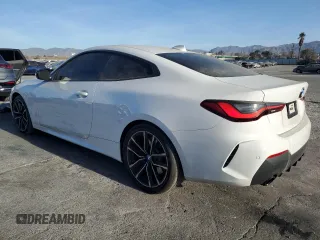 2021 BMW 4 Series 430i with VIN WBA53AP05MCG20694, listed as a Copart auction lot 85228344 with 25,979 mi miles and Salvage Title. Bid and sale history available at DreamBid. Image 2.