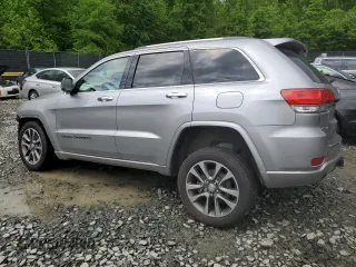 2018 Jeep Grand Cherokee Overland z VIN 1C4RJFCTXJC108624, wystawiony jako Copart lot #53738094 z przebiegiem 83 040 mil mil oraz . Historia ofert i sprzedaży dostępna na DreamBid. Obrazek 2.