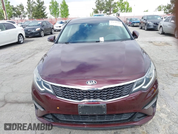 2019 Kia Optima LX z VIN 5XXGT4L37KG354649, wystawiony jako IAAI lot #42130410 z przebiegiem 61 315 mil mil oraz . Historia ofert i sprzedaży dostępna na DreamBid. Obrazek 11.