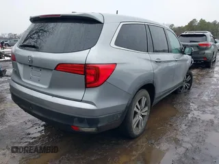 2017 Honda Pilot EX-L with VIN 5FNYF6H51HB069068, listed as a IAAI auction lot 41567728 with 100,618 mi miles and . Bid and sale history available at DreamBid. Image 4.