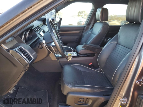 2017 Land Rover Discovery HSE Luxury with VIN SALRHBBV0HA023328, listed as a Copart auction lot 76564334 with 56,693 mi miles and Salvage Title. Bid and sale history available at carsss.com. Image 7.