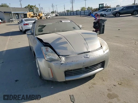 2005 Nissan 350Z Touring z VIN JN1AZ36A15M756659, wystawiony jako Copart lot #75458384 z przebiegiem 101 489 mil mil oraz Szkoda całkowita • Salvage title. Historia ofert i sprzedaży dostępna na DreamBid. Obrazek 11.