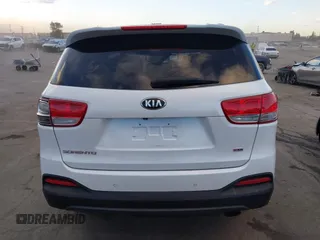 2016 Kia Sorento LX with VIN 5XYPG4A38GG075284, listed as a IAAI auction lot 41233974 with 126,044 mi miles. Bid and sale history available at carsss.com. Image 16.