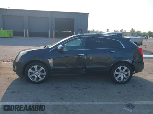 2014 Cadillac SRX Performance Collection with VIN 3GYFNFE35ES663320, listed as a IAAI auction lot 42480235 with 112,406 mi miles and . Bid and sale history available at DreamBid. Image 14.