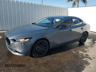 2024 Mazda 3 S Carbon Edition with VIN 3MZBPBCM7RM402393, listed as a Copart auction lot 49445145 with 33,973 mi miles and Clean Title. Bid and sale history available at DreamBid. Image 1.