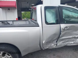 2012 Nissan Titan SE with VIN 1N6BA0CH0CN326229, listed as a IAAI auction lot 41975273 with 106,946 mi miles. Bid and sale history available at carsss.com. Image 6.