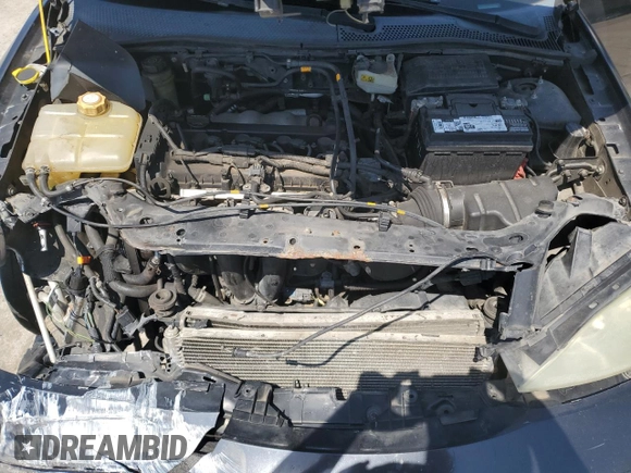 2005 Ford Focus S z VIN 3FAFP31N65R153304, wystawiony jako Copart lot #54253215 z przebiegiem 148 707 mil mil oraz Szkoda całkowita • Salvage title. Historia ofert i sprzedaży dostępna na DreamBid. Obrazek 11.