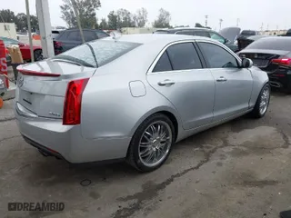 2013 Cadillac ATS Luxury with VIN 1G6AB5RX9D0156834, listed as a IAAI auction lot 41870392 with 60,952 mi miles. Bid and sale history available at carsss.com. Image 4.