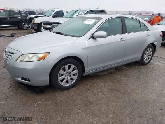 2007 Toyota Camry CE with VIN 4T1BE46K57U075558, listed as a IAAI auction lot 41948885 with 275,636 mi miles. Bid and sale history available at carsss.com. Image 2.