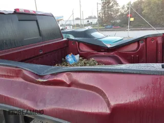 2015 GMC Sierra 1500 SLT with VIN 3GTU2VEJ9FG401660, listed as a IAAI auction lot 40648231 with 155,624 mi miles and . Bid and sale history available at DreamBid. Image 6.