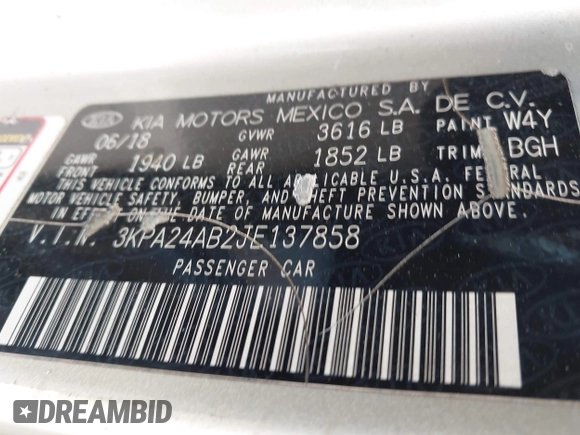 2018 Kia Rio LX with VIN 3KPA24AB2JE137858, listed as a IAAI auction lot 42016321 with 136,728 mi miles. Bid and sale history available at carsss.com. Image 9.