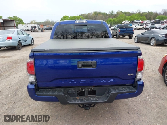 2023 Toyota Tacoma SR z VIN 3TMCZ5AN1PM589061, wystawiony jako IAAI lot #41936717 z przebiegiem 41 395 mil mil oraz . Historia ofert i sprzedaży dostępna na DreamBid. Obrazek 16.
