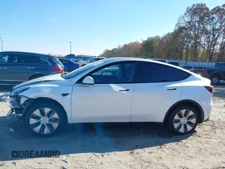 2023 Tesla Model Y Long Range with VIN 7SAYGAEE1PF828338, listed as a IAAI auction lot 40978725 with Not Provided miles and . Bid and sale history available at DreamBid. Image 15.