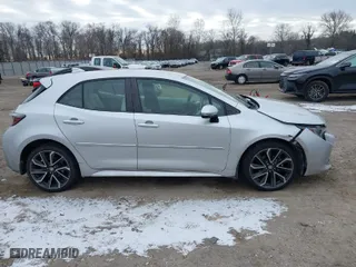 2019 Toyota Corolla Hatchback SE with VIN JTNK4RBE6K3064695, listed as a IAAI auction lot 41296362 with 56,282 mi miles. Bid and sale history available at carsss.com. Image 13.