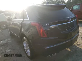 2022 Cadillac XT5 FWD Luxury z VIN 1GYKNAR49NZ159814, wystawiony jako Copart lot #74506584 z przebiegiem 7 069 mil mil oraz Nie do naprawy • Non repairable. Historia ofert i sprzedaży dostępna na DreamBid. Obrazek 2.