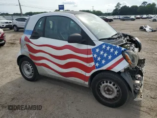 2016 Smart fortwo Passion with VIN WMEFJ5DA2GK140588, listed as a Copart auction lot 57504315 with 59,145 mi miles and Salvage title. Bid and sale history available at DreamBid. Image 4.