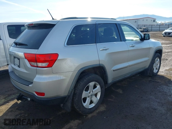 2011 Jeep Grand Cherokee 70th Anniversary with VIN 1J4RR4GTXBC718994, listed as a IAAI auction lot 41688158 with 121,680 mi miles. Bid and sale history available at carsss.com. Image 4.