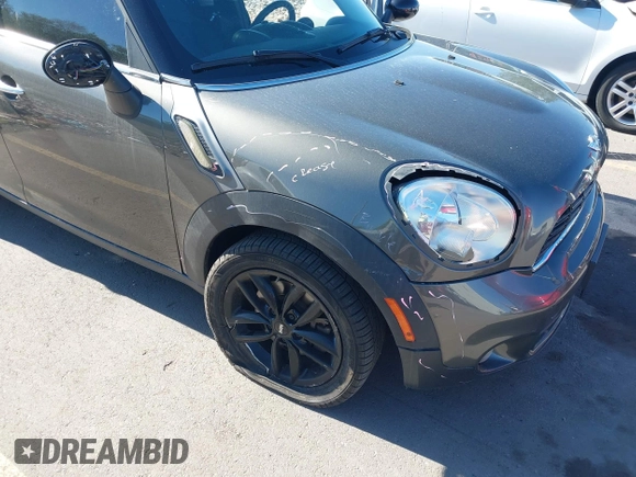 2014 MINI Countryman S z VIN WMWZC3C59EWP29686, wystawiony jako IAAI lot #42292047 z przebiegiem 93 139 mil mil oraz . Historia ofert i sprzedaży dostępna na DreamBid. Obrazek 6.