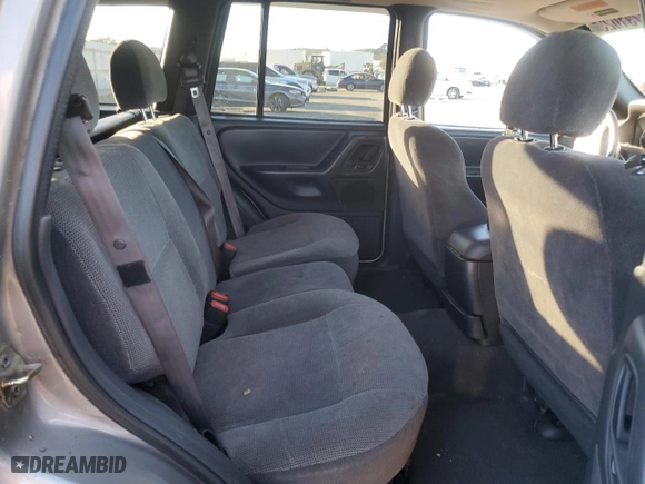 1999 Jeep Grand Cherokee Laredo with VIN 1J4GW58NXXC747537, listed as a Copart auction lot 87310234 with 0 mi miles and Salvage Title. Bid and sale history available at carsss.com. Image 11.