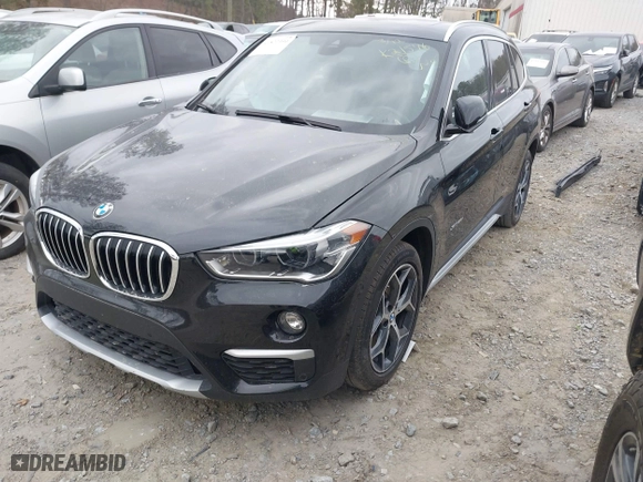 2018 BMW X1 xDrive28i with VIN WBXHT3C34J5K21576, listed as a IAAI auction lot 41822390 with 69,645 mi miles. Bid and sale history available at carsss.com. Image 17.