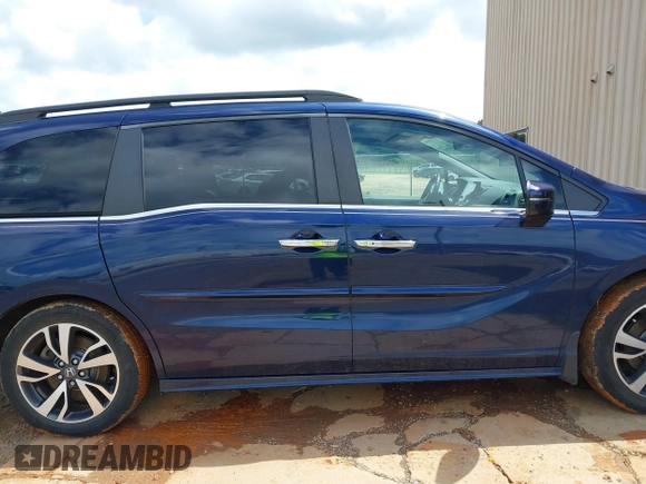 2022 Honda Odyssey Touring with VIN 5FNRL6H86NB004865, listed as a IAAI auction lot 42254009 with 47,229 mi miles and . Bid and sale history available at DreamBid. Image 13.