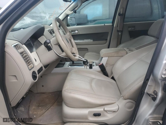 2009 Mercury Mariner Premier with VIN 4M2CU87709KJ06169, listed as a Copart auction lot 45117035 with 208,223 mi miles and Salvage Title. Bid and sale history available at carsss.com. Image 7.