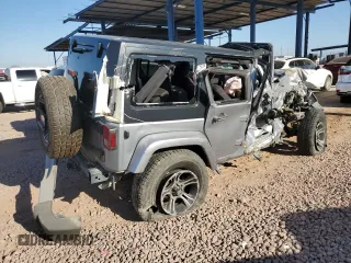 2015 Jeep Wrangler Unlimited Sahara z VIN 1C4BJWEG1FL617428, wystawiony jako Copart lot #55850005 z przebiegiem Nie podano mil oraz Szkoda całkowita • Salvage title. Historia ofert i sprzedaży dostępna na DreamBid. Obrazek 3.