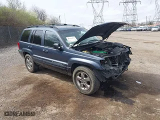 2004 Jeep Grand Cherokee Limited with VIN 1J8GW58N44C274714, listed as a IAAI auction lot 41922819 with 204,251 mi miles. Bid and sale history available at carsss.com. Image 1.