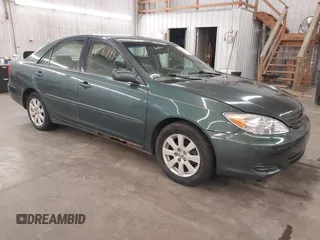 2004 Toyota Camry LE with VIN 4T1BE32K04U361670, listed as a IAAI auction lot 42139994 with 205,899 mi miles. Bid and sale history available at carsss.com. Image 1.