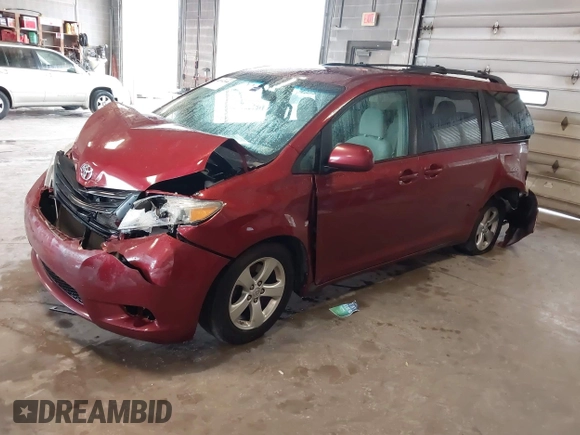 2012 Toyota Sienna LE AAS with VIN 5TDKK3DC5CS277303, listed as a IAAI auction lot 42162586 with 128,656 mi miles and . Bid and sale history available at DreamBid. Image 2.